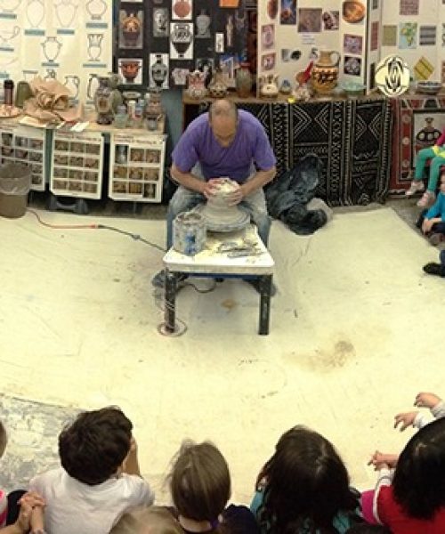 75 students assembly style multicultural potters wheel program - Copy
